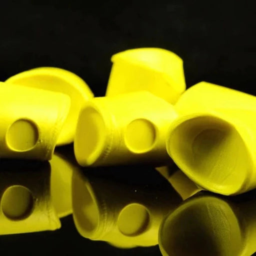 An assortment of Howitzer Baitfish Popper Heads in Yellow #383, showcasing the bright, high-visibility yellow closed-cell foam heads in small and medium sizes for topwater bass and panfish patterns.