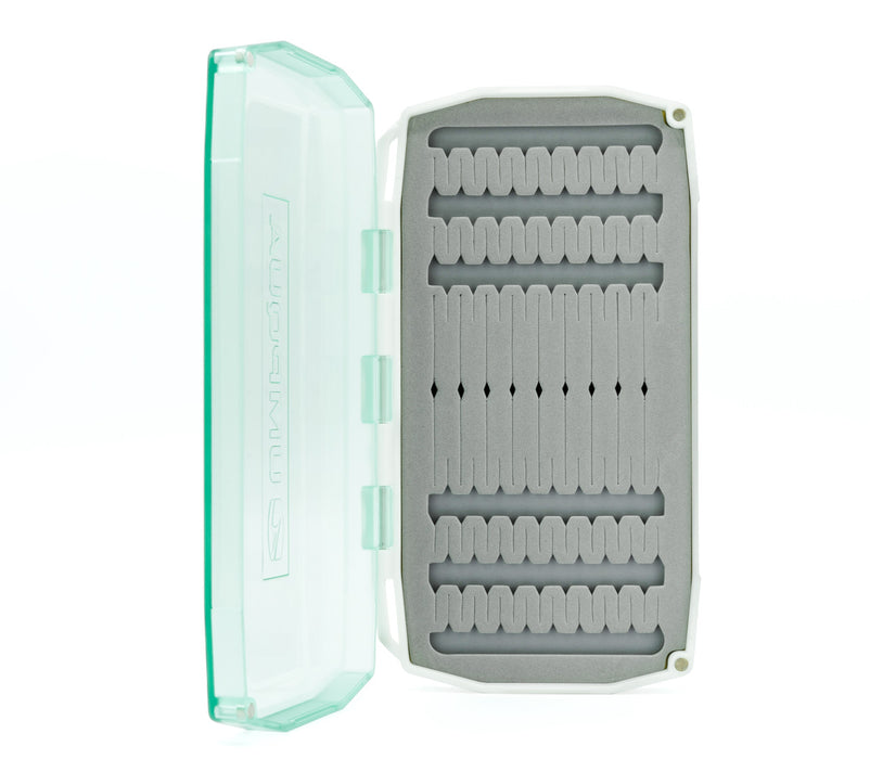 Aqua-colored Umpqua UPG Foam Flats fly box open to show the slit foam insert for saltwater flies.