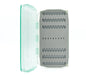 Aqua-colored Umpqua UPG Foam Flats fly box open to show the slit foam insert for saltwater flies.