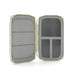 Open tan Umpqua Tailwater Mini Foam fly box showing the micro-slit foam side and magnetic insert compartments.