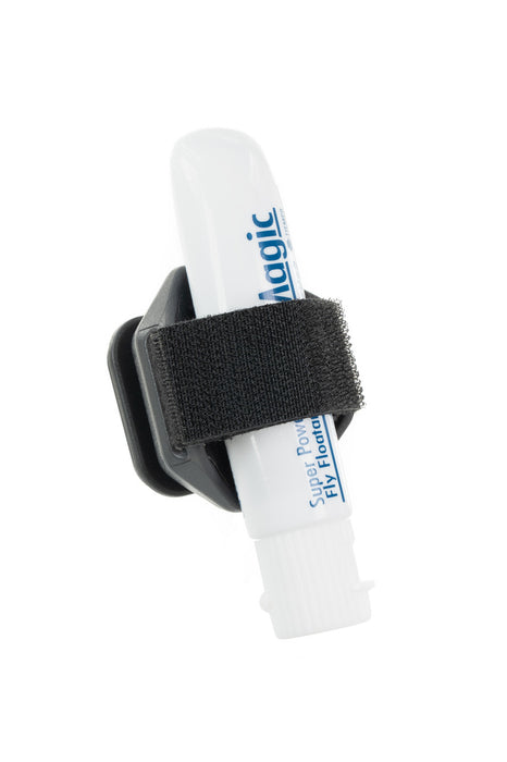 Side angle of the Umpqua Link DryDock Floatant Holder holding a white gel floatant container with its adjustable strap.