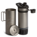 Grayl 24oz GeoPress Ti Purifier disassembled showing the outer titanium cup, inner press sleeve with filter cartridge, and drink cap
