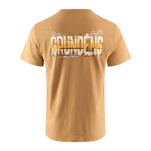 The back view of a Grundéns Redfish Flats short-sleeve t-shirt in Whiskey tan, showcasing an oversized horizontal back graphic of a marshland fishing scene with redfish country silhouettes inside the Grundéns logo text.