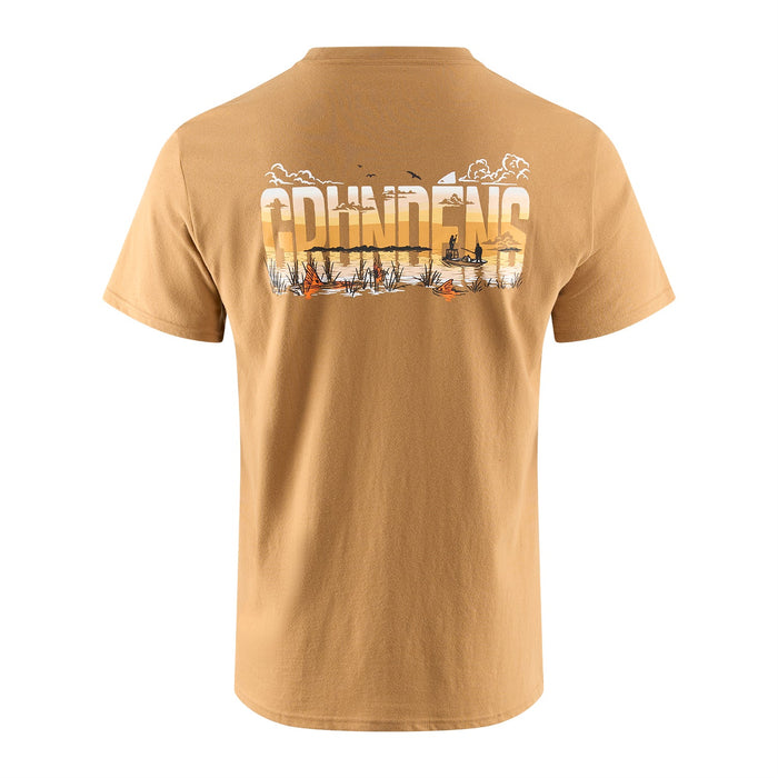 The back view of a Grundéns Redfish Flats short-sleeve t-shirt in Whiskey tan, showcasing an oversized horizontal back graphic of a marshland fishing scene with redfish country silhouettes inside the Grundéns logo text.