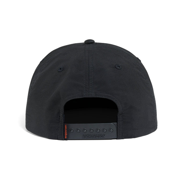 Back view of the black Grundens Trout Patch Rope Trucker Hat showing the classic adjustable snapback closure