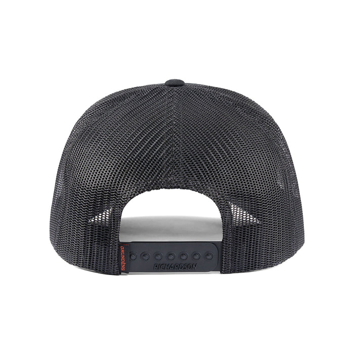 Back profile of the black Grundens Sentinel of the Seas Trucker Hat showing the classic mesh backing and adjustable snapback closure