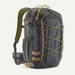 Forge Grey variant of the Patagonia Stealth Backpack 25L featuring a charcoal grey technical fabric layout and integrated external gear lashing cords