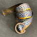 Golden brown speckled Brown Trout pattern DRIFT Reversible Wading Belt showing the low-profile metal buckle.