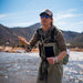 Angler wearing Orvis Clearwater Zip Waders fly fishing in river