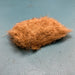 Fulling Mill CDC Dubbing in Tan color, showcasing the light, buggy texture of premium CDC feathers used for tying caddis and mayfly emerger patterns.