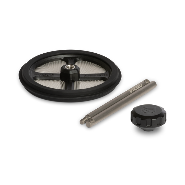 Grayl Titanium Coffee Press Kit components disassembled showcasing the circular mesh filter screen, two-piece titanium press rod, and black textured press knob