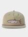 Khaki green Duck Camp Grandpa Hat featuring a structured 5-panel rope design and a detailed rainbow trout patch.