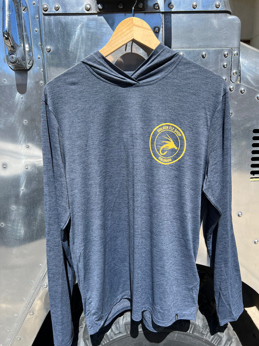 Smolder Blue Patagonia Capilene Cool Daily Hoody hanging up, showing the left chest Golden Fly Shop text branding.