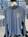 Smolder Blue Patagonia Capilene Cool Daily Hoody hanging up, showing the left chest Golden Fly Shop text branding.