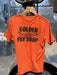 Back view of the Coal Orange Patagonia Cap Cool Merino Shirt showcasing the custom Cutty Shark streamer graphic.