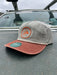 Golden Fly Shop Hat Skully Snapback Pebble Rust 2026 edition structured rope hat featuring a circular rust orange embroidered fly silhouette patch