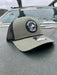 Green w/ Rope variant of the Golden Fly Shop 112 Trucker Hat 2026 showcasing a sage green crown, black mesh back, thin black accent rope, and circular rubber fly logo patch