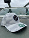 Golden Fly Shop Hat Grey Camo Dots 2026 edition technical performance cap featuring a circular embroidered trout logo patch on a Legacy REMPA frame