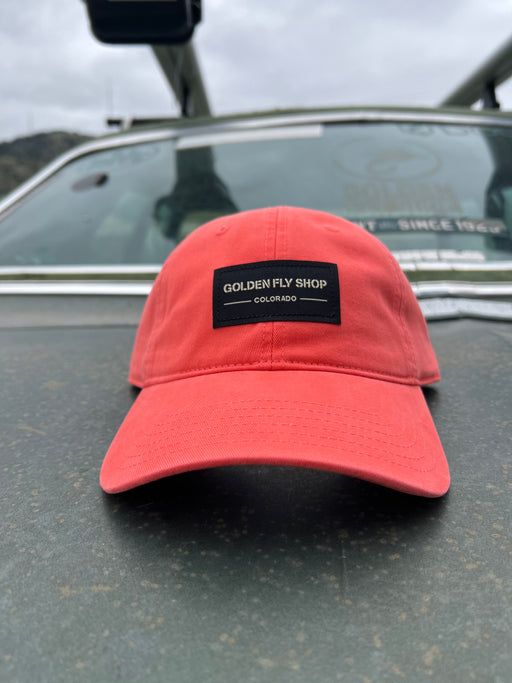 Golden Fly Shop 326 Hat Solid Coral 2026 edition low-profile dad hat with a custom embroidered black Golden Fly Shop Colorado logo patch