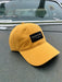 Golden Fly Shop 326 Hat Solid Mustard 2026 edition low-profile dad hat with a custom embroidered black Golden Fly Shop Colorado logo patch
