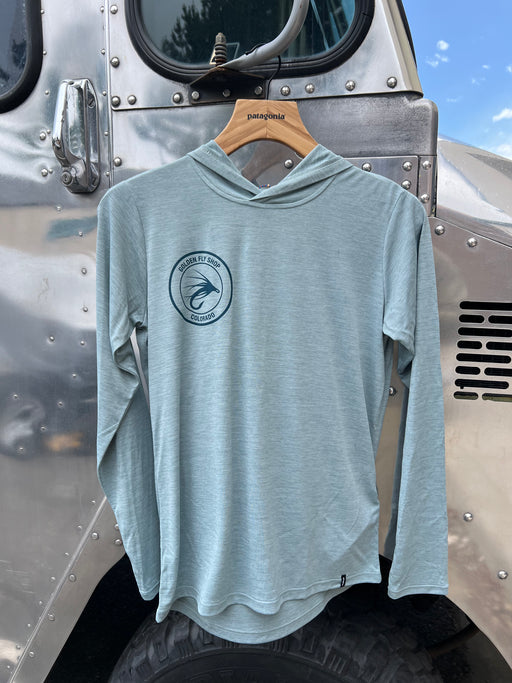 Light Thermal Blue Patagonia Women's Capilene Cool Daily Hoody featuring the circular Golden Fly Shop Colorado logo on the right chest