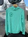 Aqua Stone teal Patagonia Women's Capilene Cool Sun Hoody featuring the circular Golden Fly Shop Colorado logo patch.
