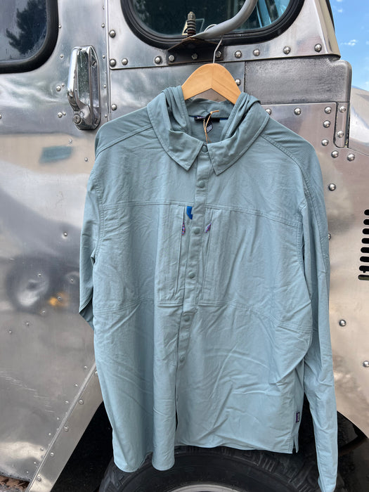 Front profile of the Blue Sage Patagonia River Rambler Hybrid Sun Hoody demonstrating the casual button-down collar layout with the hood removed