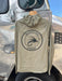 River Rock Green Patagonia River Rambler Hybrid Sun Hoody displaying the circular Golden Fly Shop Colorado logo across the back shoulders