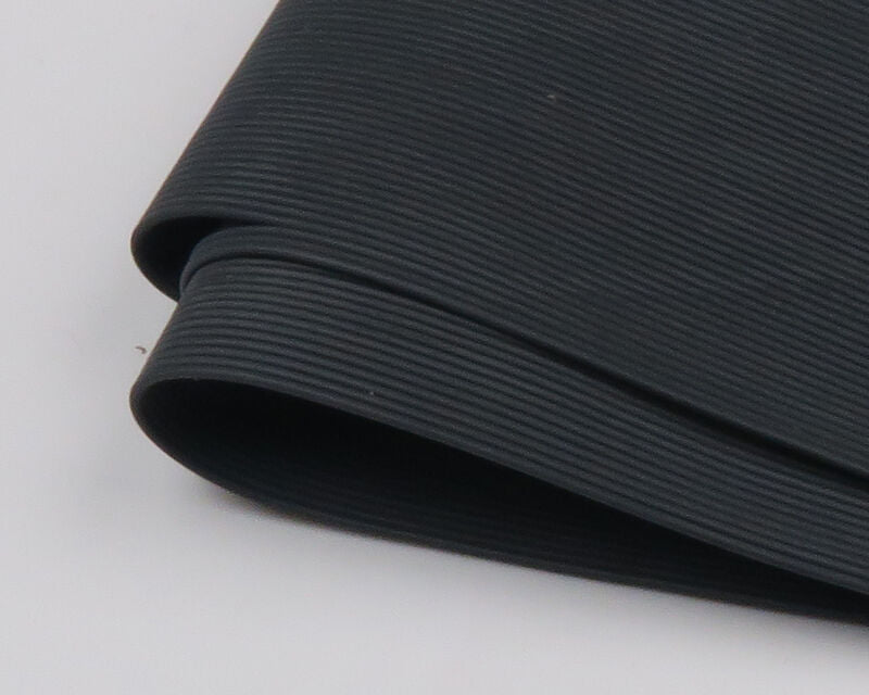 A package of Hareline Round Rubber Medium legs in Black #11, displaying a bundle of solid black round rubber strands designed for buggy silhouettes and popper legs.