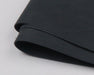A package of Hareline Round Rubber Medium legs in Black #11, displaying a bundle of solid black round rubber strands designed for buggy silhouettes and popper legs.