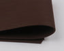 A package of Hareline Round Rubber Medium legs in Brown #40, showing a dense bundle of matte brown round rubber strands ideal for stoneflies and crayfish patterns.