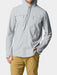 Model wearing the Duck Camp Hybrid Guide Hoodie in Highrise grey to show the technical fit for fly fishing.