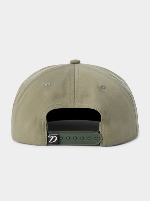 The back of a structured baseball cap in a muted sage green color, featuring a dark green adjustable snapback closure with a small white and black logo patch.