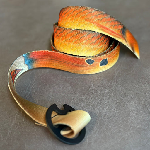 Copper-colored Redfish skin spot pattern DRIFT Reversible Webbing Belt with a durable polyester strap.