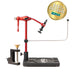 The Rambler Co. Nomad Fly Tying Vise in Rambler Red anodized aluminum, mounted on its black pedestal base alongside the included c-clamp accessory, featuring a gold ICAST 2025 Best of Category award badge overlay.