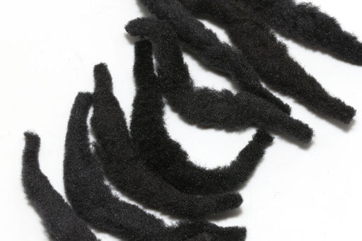 A package of Spawn Polliwog Tails in Black #11, displaying a bundle of tapered, deep black synthetic tails ideal for buggy leeches and dark streamer patterns.