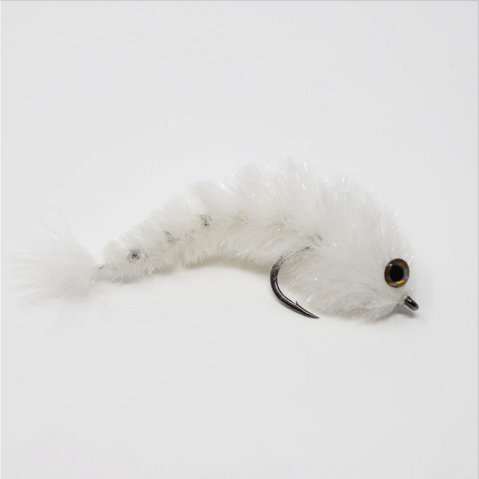 White Chocklett's Jungle Finesse Changer baitfish fly showing the flexible multi-jointed body design for natural swimming action