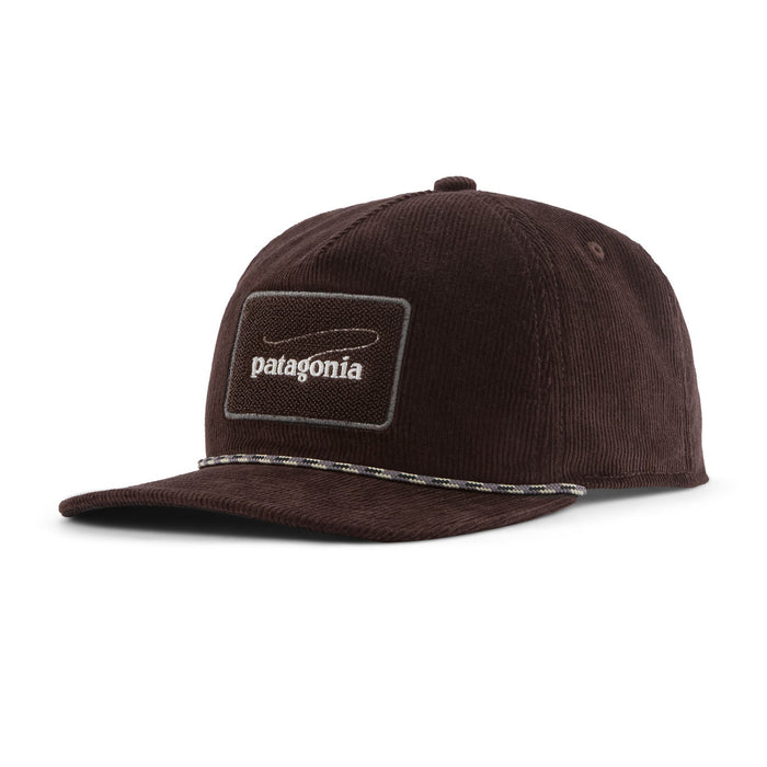 A dark brown corduroy baseball cap with a rectangular Patagonia logo patch on the front and a decorative stitched line across the brim, shown on a plain white background.