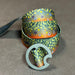 Worm-like vermiculation pattern Brook Trout skin design DRIFT Reversible Webbing Belt laid out flat.