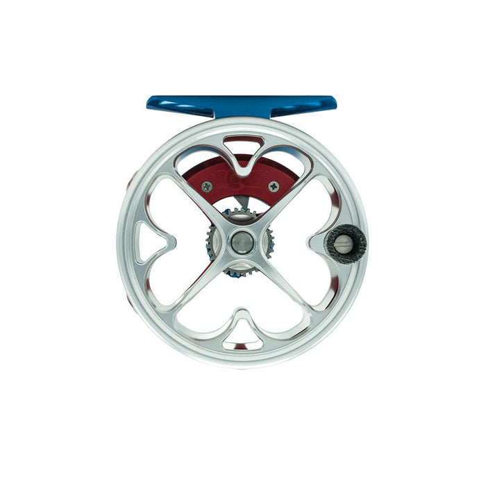 The reverse frame view of the Ross Colorado Liberty fly reel, highlighting the precise CNC face-milled aerodynamic spoke patterns and the custom blue and red anodized finish elements.