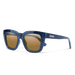 Suncloud Marion polarized sunglasses in crystal denim blue frame with brown lenses.