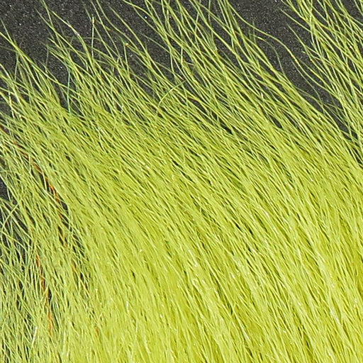 A close-up view of Hareline Pastel Northern Bucktail in Pastel Yellow #383, displaying a premium deer tail with soft, high-visibility pastel yellow fibers.