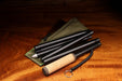 Picture of Hareline Folding Wading Staff folded up with bag.