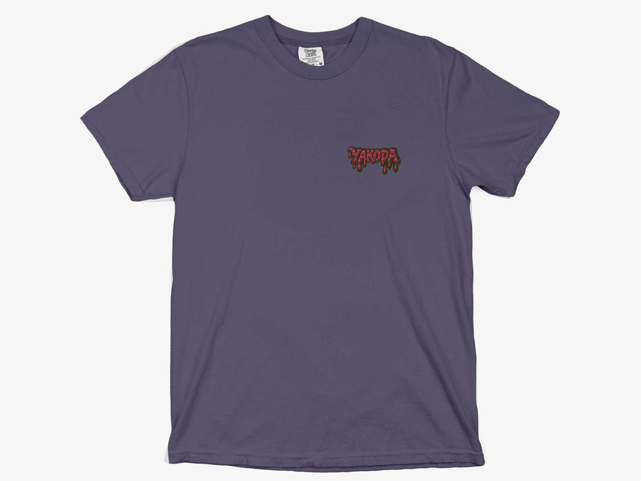 Front view of the grape purple Yakoda Drippy Trout Short Sleeve Tee showing the small neon retro chest logo.