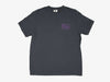 Front view of the dark grey Yakoda Linear Canyon Short Sleeve Tee featuring a minimal purple chest logo.