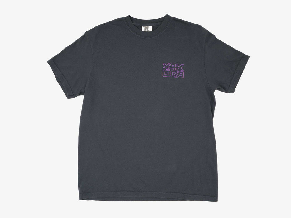 Front view of the dark grey Yakoda Linear Canyon Short Sleeve Tee featuring a minimal purple chest logo.