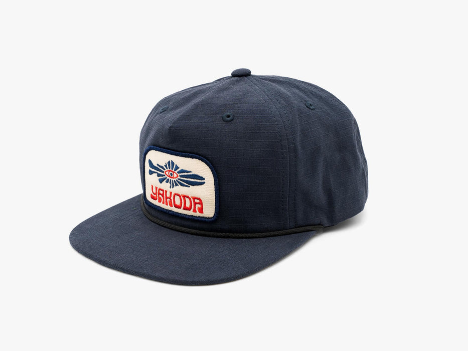 Basalt dark grey Yakoda Mystic Trout Hat showing the unstructured 5-panel design and embroidered trout patch.