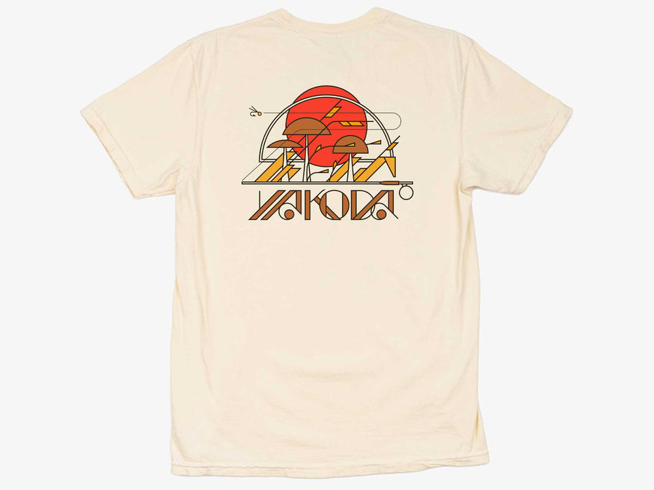 Flat view of the ivory Yakoda Prairie Tee showcasing the western sunrise, cottonwood, and fly fishing back graphic.