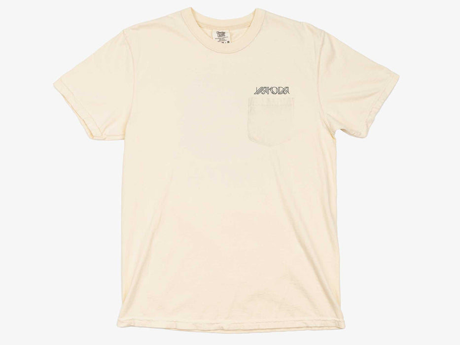 Front view of the ivory Yakoda Prairie Short Sleeve Tee showing the functional left chest pocket and logo print.