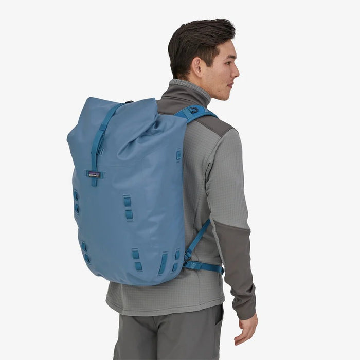 rolltop backpack patagonia Disperser Roll-Top Pack 40L featuring a durable black textile construction Patagonia Arbor Roll Top Pack